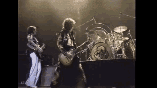 Led Zeppelin Earls Court Black Dog Jimmy Page John Bonham GIF - Led Zeppelin Earls Court Black Dog Jimmy Page John Bonham GIFs