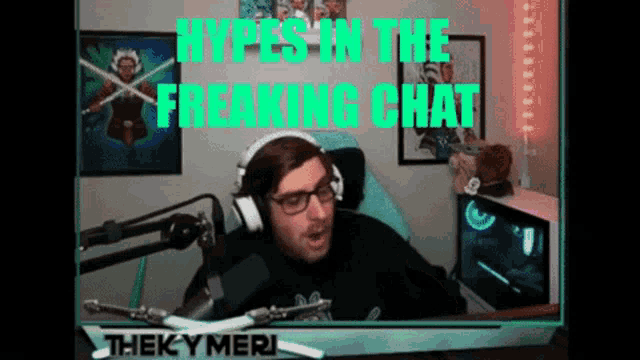 a man wearing headphones and glasses is sitting in front of a microphone with the words hypes in the freaking chat above him