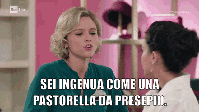 two women are talking to each other and the caption says sei ingenua come una pastorella da prespio