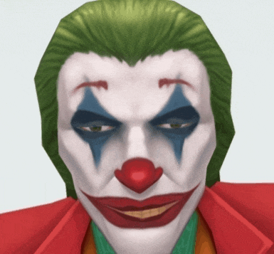 a close up of the face of a clown with a red nose