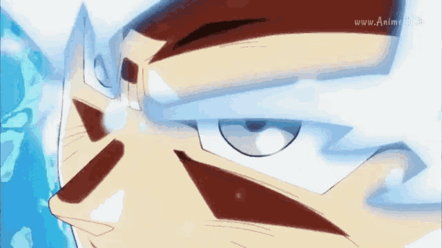 a close up of a cartoon character 's face with the website www.anime.tv in the lower right corner