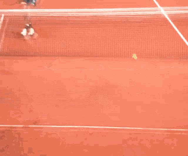 a tennis court with a bnp paribas banner behind it