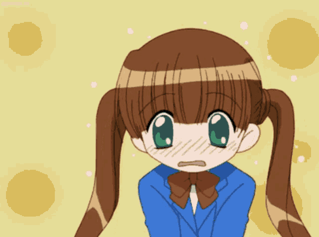 a girl with pigtails and green eyes is wearing a blue suit