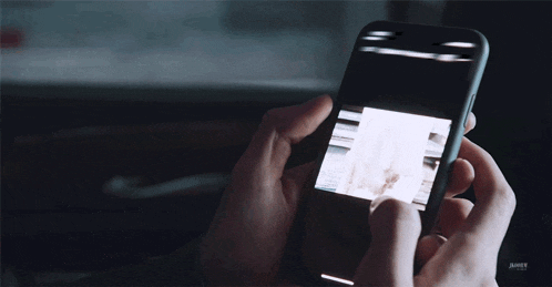 a person is holding a cell phone with the word jumpy on the bottom of the screen