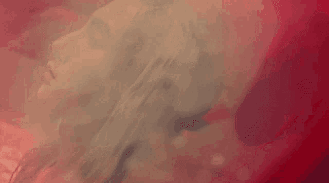 a painting of a woman 's face with smoke coming out of her mouth