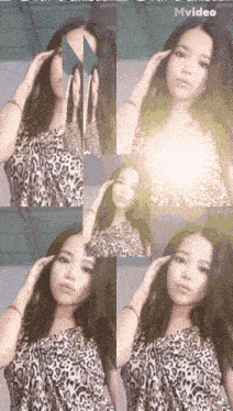 a woman in a leopard print dress is holding a mirror over her face