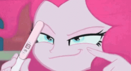 pinkie pie from my little pony equestria girls is holding a pregnancy test .