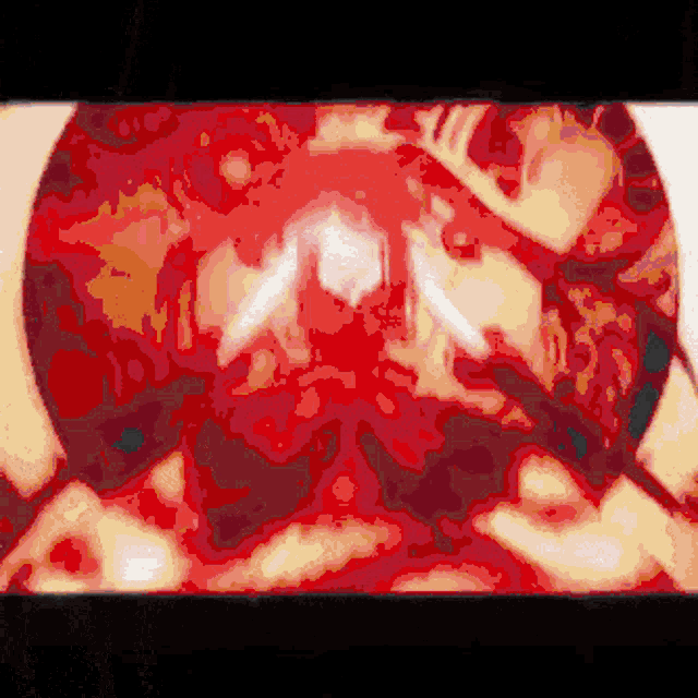 a pixelated image of a person 's face in a red circle