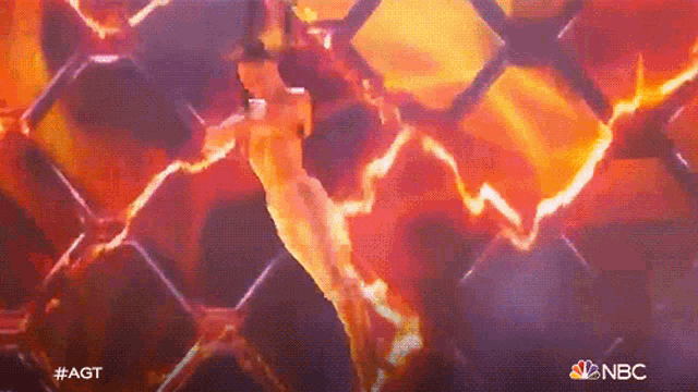 a painting of a person in a cage with the nbc logo in the corner
