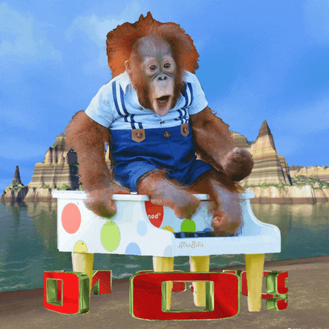 a monkey is sitting on a polka dot piano that says abc billa