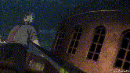 a man in a suit and tie is holding a sword in front of a building .