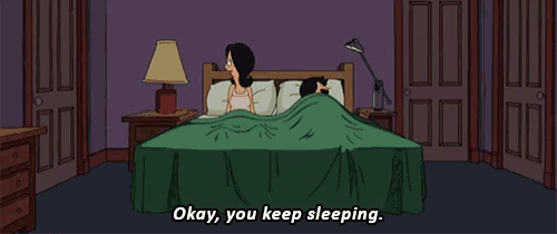 a cartoon says " okay you keep sleeping " in front of a man and woman in bed
