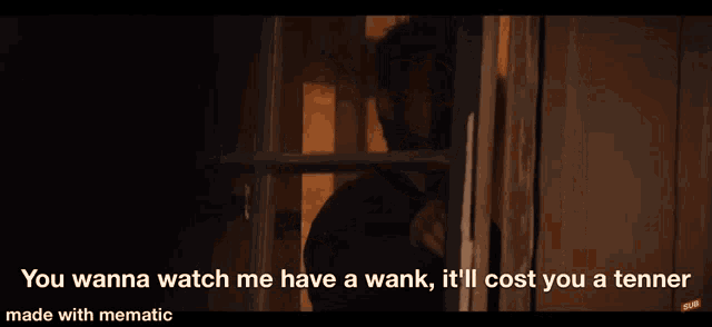 a man is standing in front of a window with the words you wanna watch me have a wank