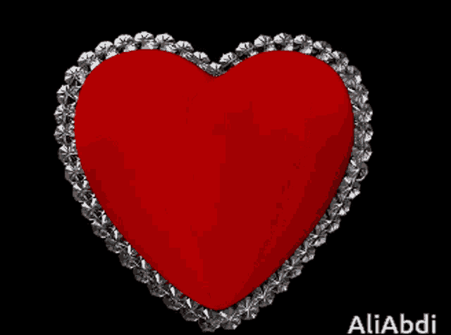 a red heart surrounded by diamonds with the name aliabdi on the bottom