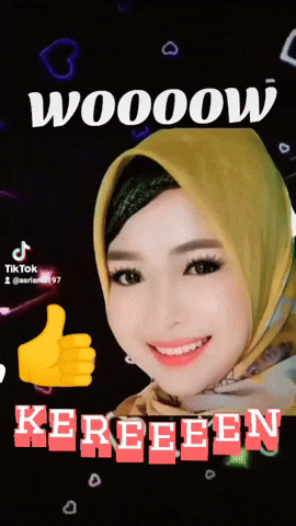 a woman wearing a yellow head scarf is smiling with the words wooow kereeeen behind her