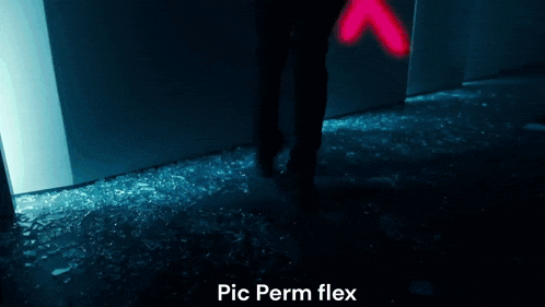 a person is standing on a broken glass floor with the words pic perm flex below them