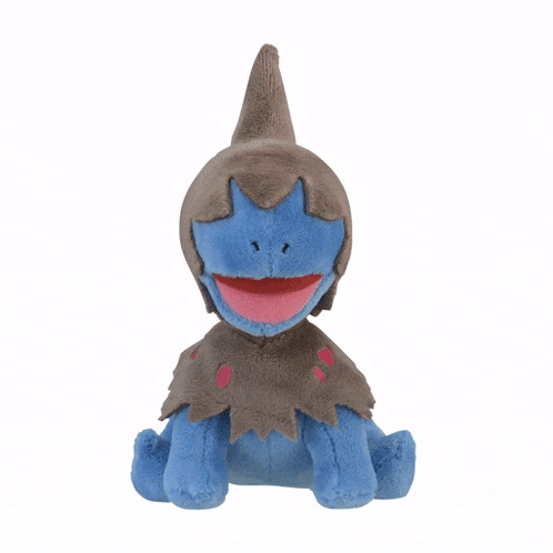 a blue and brown stuffed animal with a red mouth is sitting on a white background