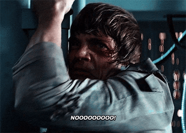 a man is hanging upside down and says " noooooo "