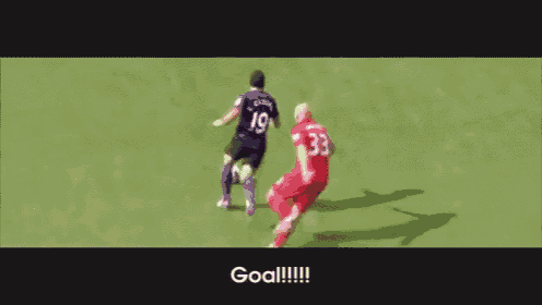 a soccer player is kicking a ball and the words goal are visible