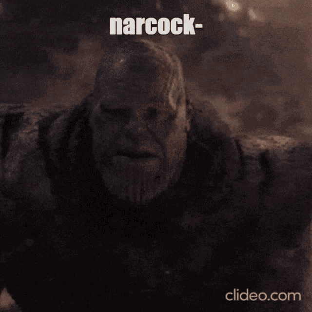 a close up of a man covered in dirt with the word narcock written above him