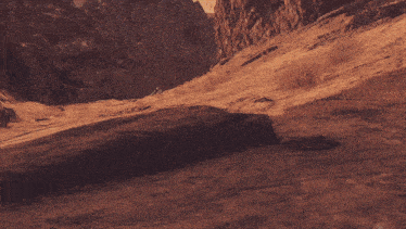 a desert landscape with rocks and dirt on it