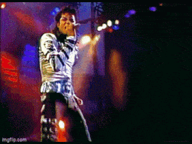 a pixelated image of a man singing into a microphone with the website imgflip.com in the corner