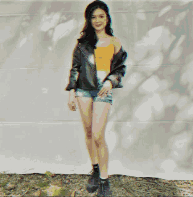 a painting of a woman standing in front of a blue and yellow striped wall