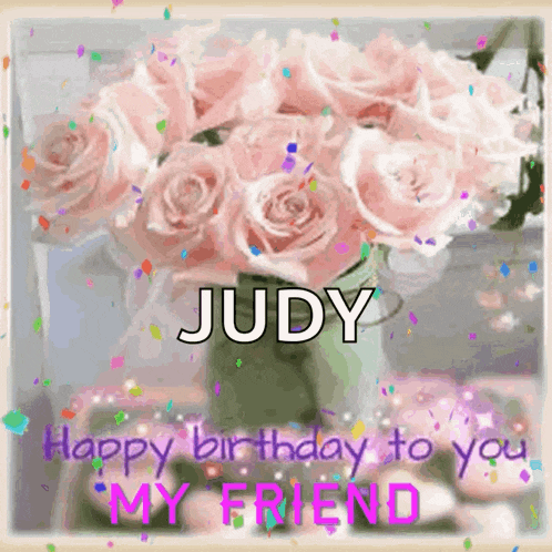 a bouquet of pink roses in a vase with the name judy written on it