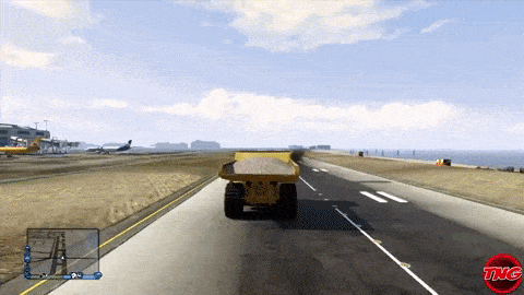 a video game screen shows a yellow truck driving down the road