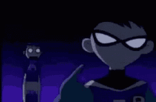 robin from the teen titans go is standing next to a robot in the dark .