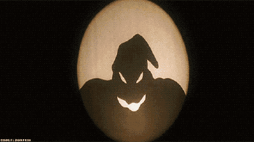 a shadow of a bat is cast on a white background