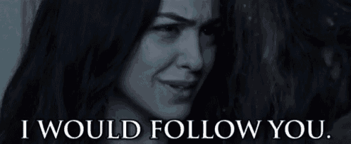 a close up of a woman with the words i would follow you