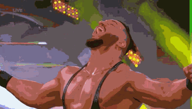 a pixelated image of a wrestler with the word live in the corner