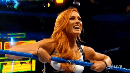 a pixelated image of a woman in a wrestling ring that says live