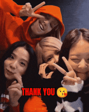 a group of girls are posing for a picture and the words thank you are on the bottom right