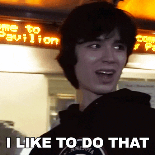 a young man says " i like to do that " in front of a sign that says " welcome to pavilion "