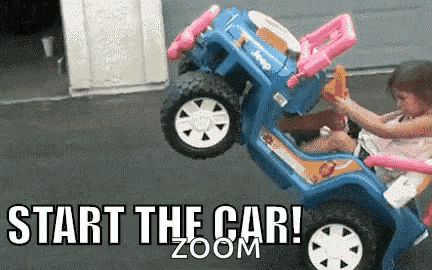 a little girl is sitting in a blue toy car with the words start the car zoom written on the bottom .