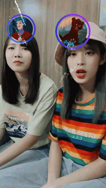 a girl wearing a shirt that says ' a.2.0 ' on it