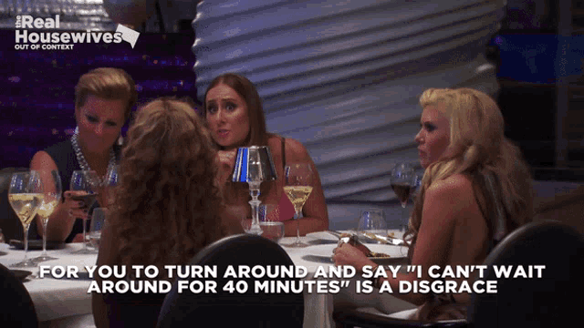 a group of women sitting at a table with a caption that says " for you to turn around and say