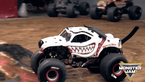 a monster jam monster truck with a cat tail
