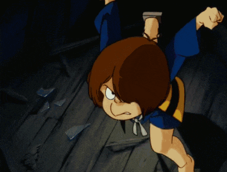 a cartoon character with a blue shirt and yellow buttons is standing on a wooden floor