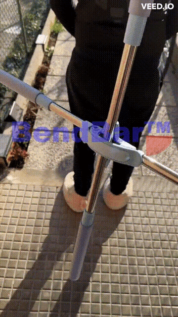 a person standing on a tiled floor with the words veed.jo written on the bottom