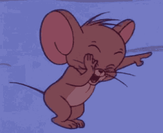 jerry from tom and jerry is laughing and covering his mouth with his hands .