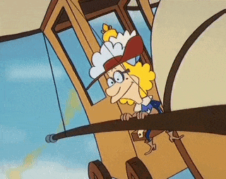 a cartoon character is riding a horse drawn carriage in the air .