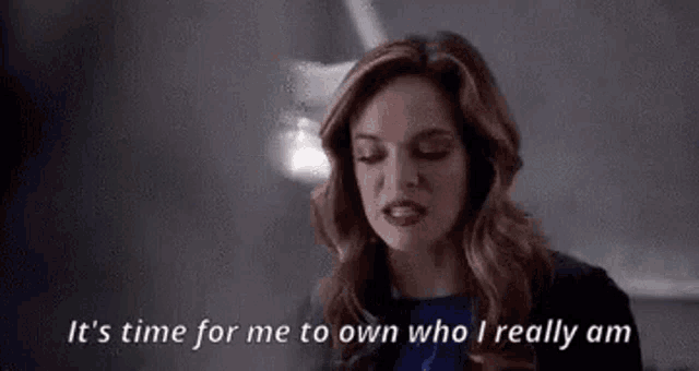 a woman is making a funny face and says `` it 's time for me to own who i really am '' .