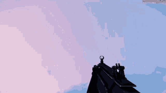 a screenshot of a video game shows a gun being held up in the air