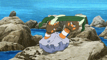 a cartoon character is laying on a rock in front of the ocean