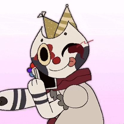 a cat wearing a party hat is holding a lollipop .