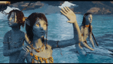 a woman with a braided hair style is waving her hand in the water