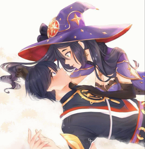 a girl in a witch hat is kissing a boy